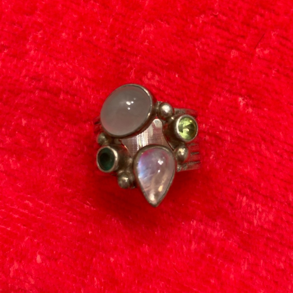 Sterling silver Sajen ring. Polished  & cut stones